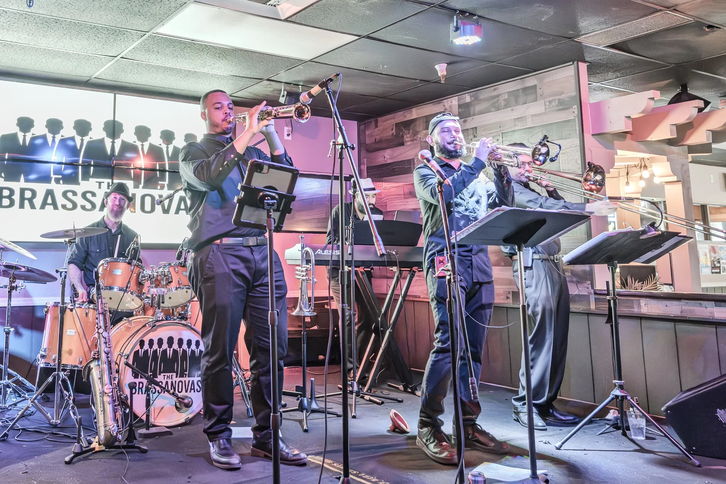 The Brassanovas horn section during a live performance